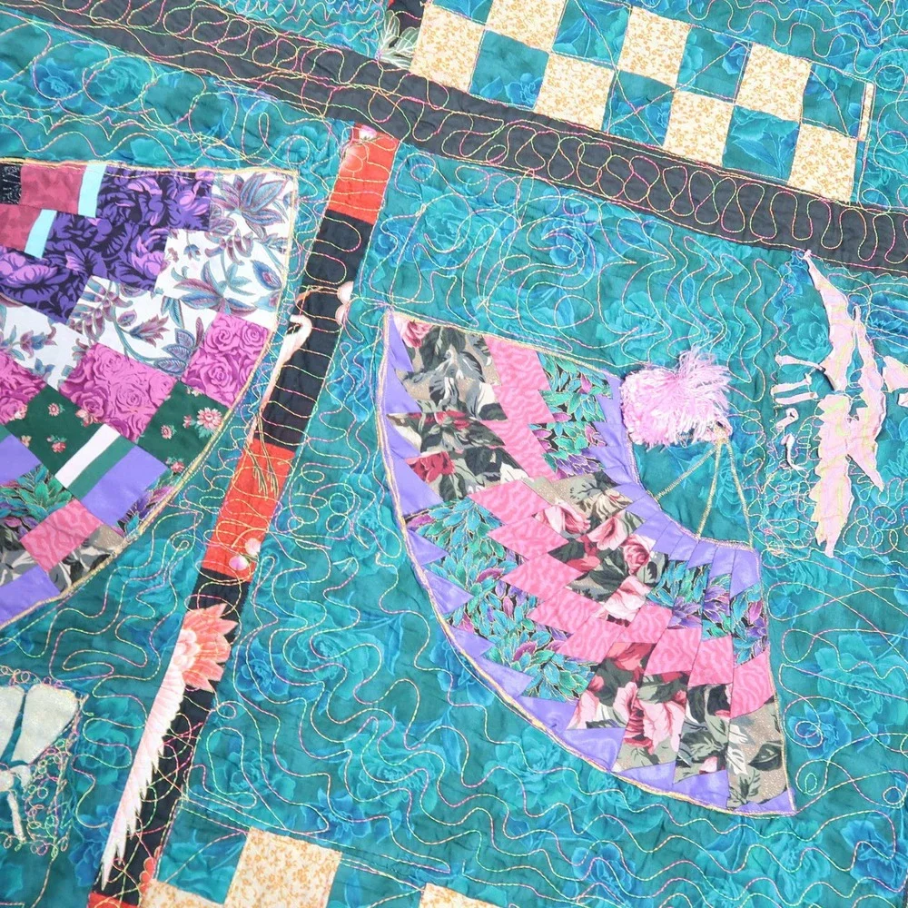 Vintage teal blue and pink oriental fan design quilt blanket with tassel